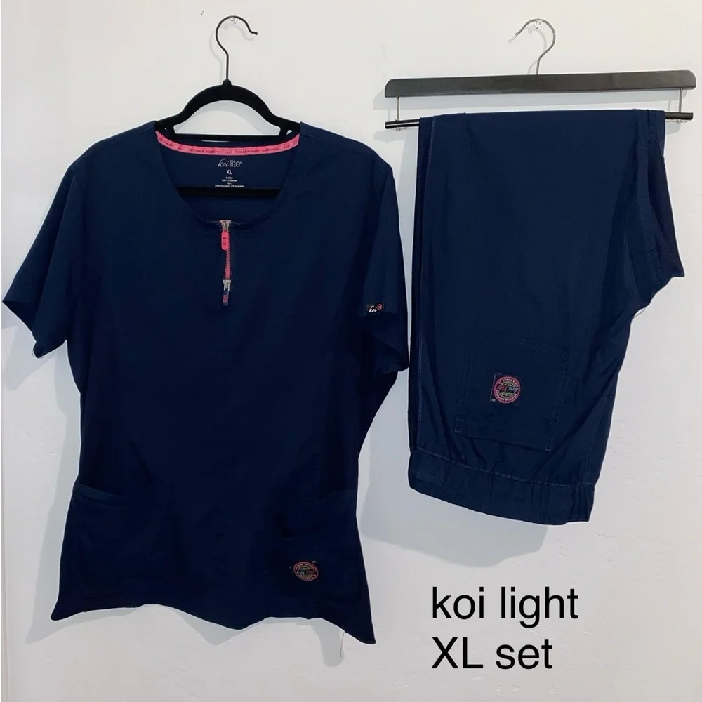 koi Navy Blue Scrub Top & Jogger Pants Set with Pink Accents